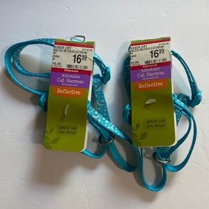 2 light blue cat, harnesses with the stars and moons identical. Brand new.